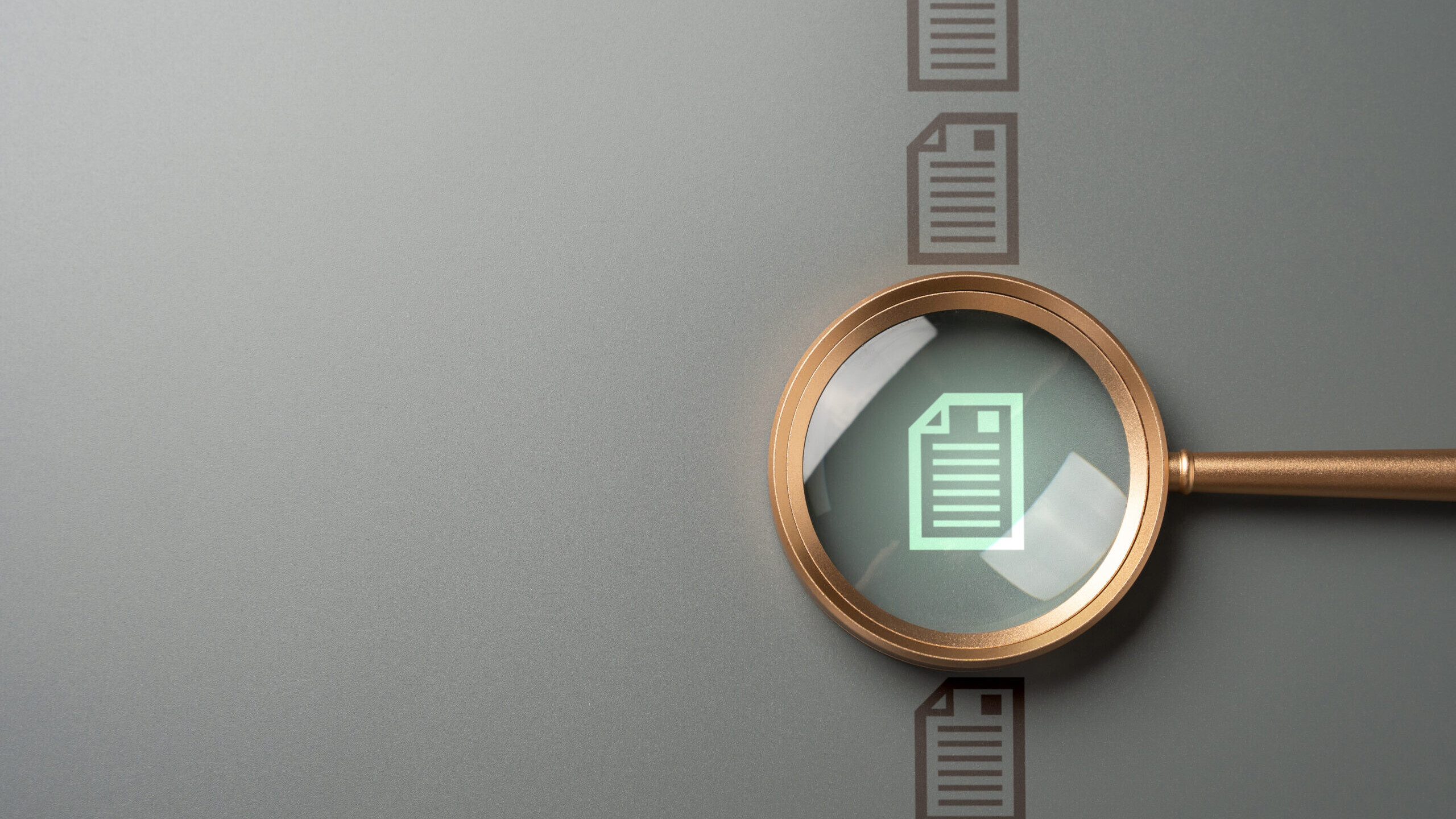 Magnifying glass over a document representing due diligence on the risks of alternative assets in an IRA