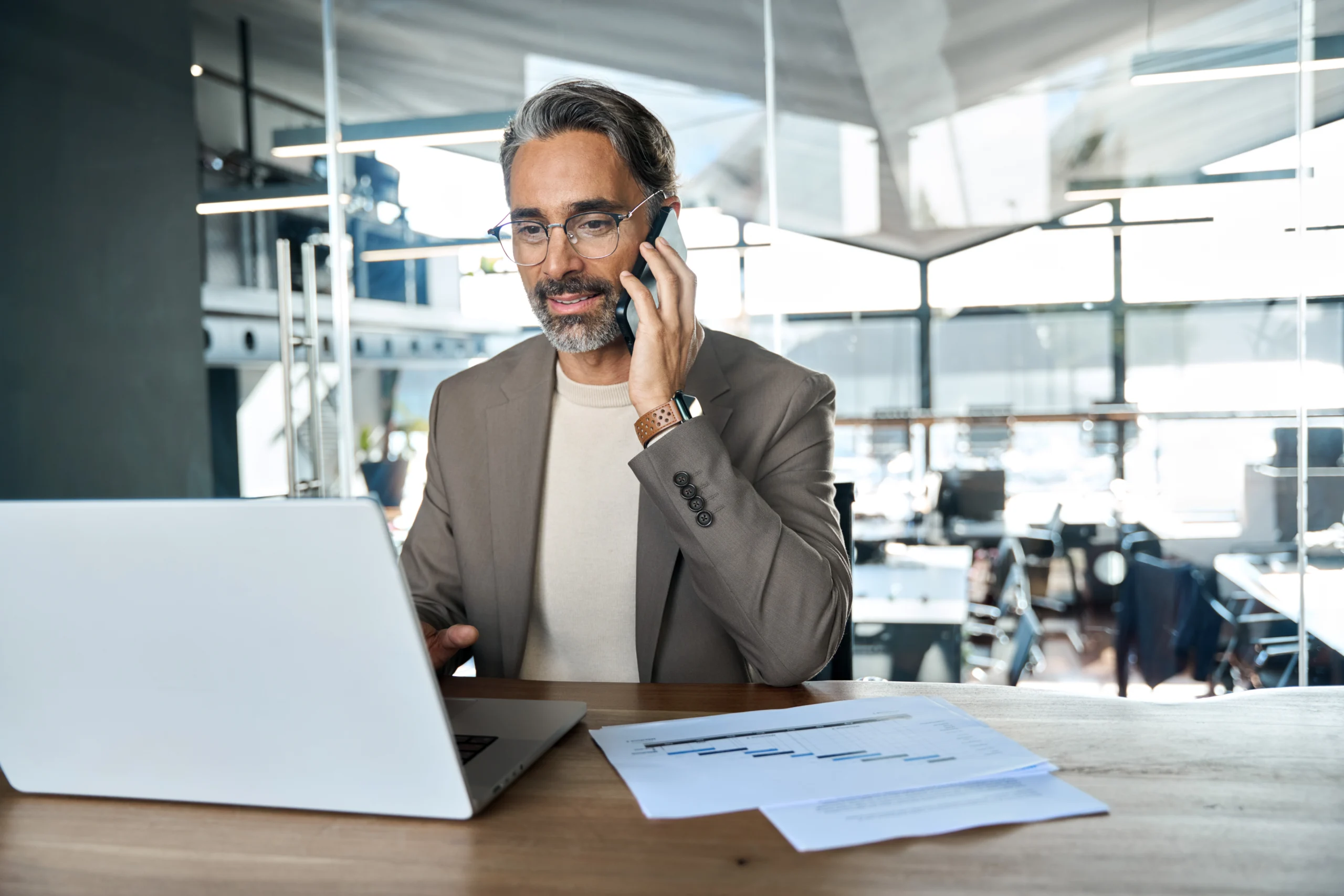 middle aged business man on the phone