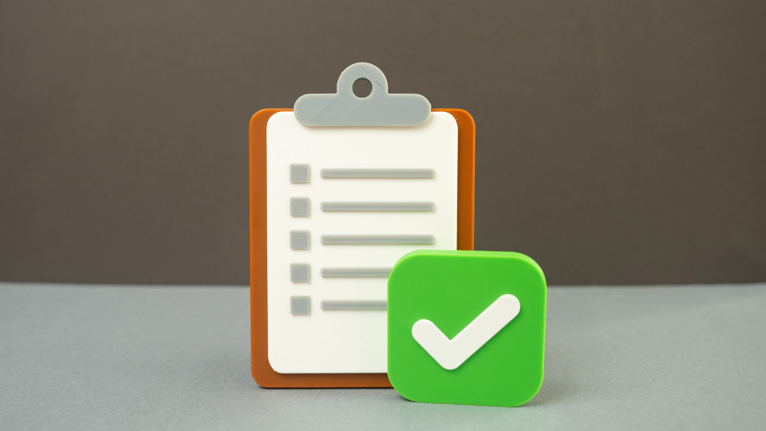 Clipboard checklist with a green checkmark for a Self-Directed IRA year-end checklist