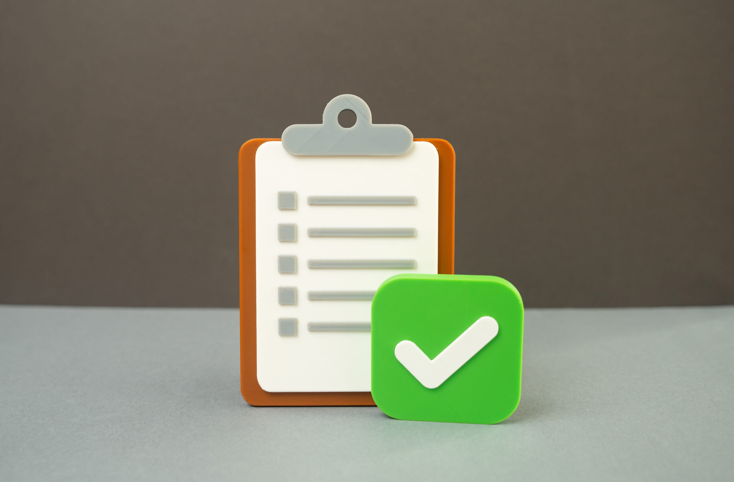 Clipboard checklist with a green checkmark for a Self-Directed IRA year-end checklist