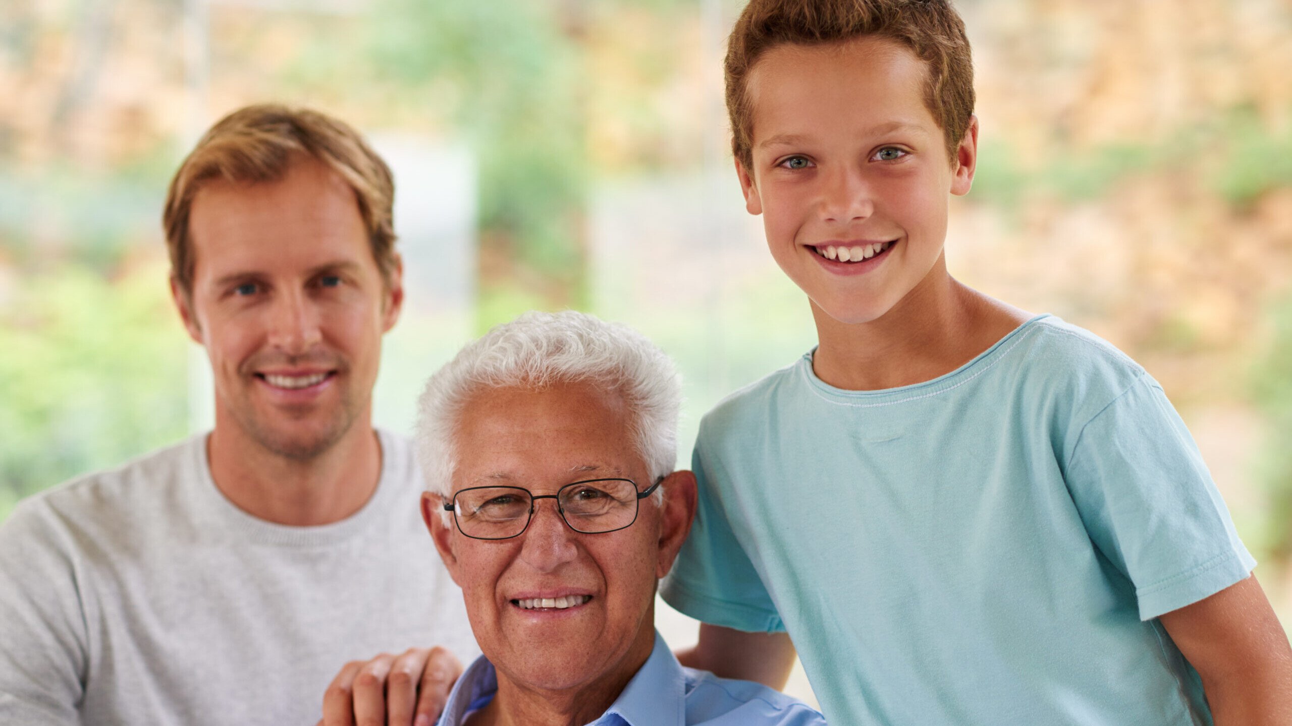 Grandfather, son, and grandson together, representing the family members named as contingent beneficiaries on a retirement account
