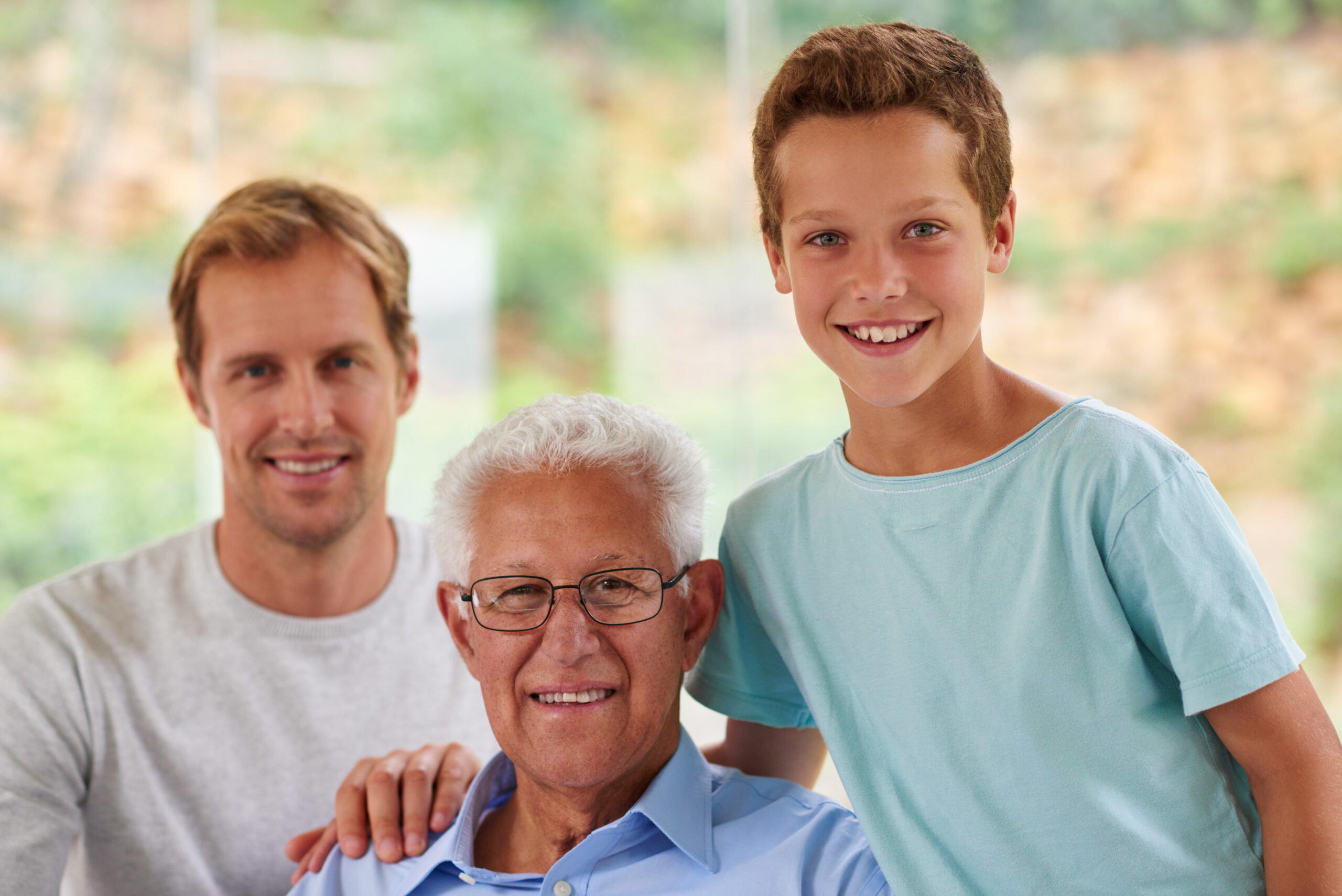 Grandfather, son, and grandson together, representing the family members named as contingent beneficiaries on a retirement account